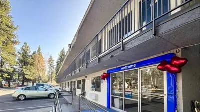a building with a car parked in front of it at Motel 6-Big Bear Lake, CA in Big Bear Lake