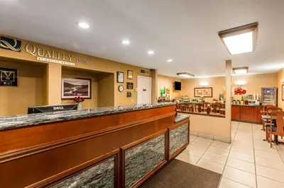 a lobby of a fast food restaurant with a bar at Quality Inn Near China Lake Naval Station in Ridgecrest