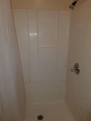 a shower in a bathroom with a shower curtain at Pads on Pasadena Ave in Los Angeles