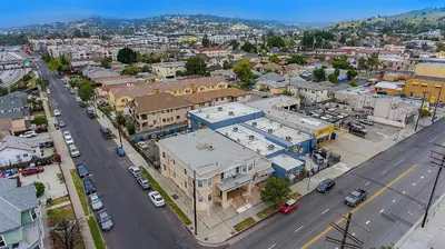 an aerial view of a city with buildings and a street at Pads on Pasadena Ave in Los Angeles