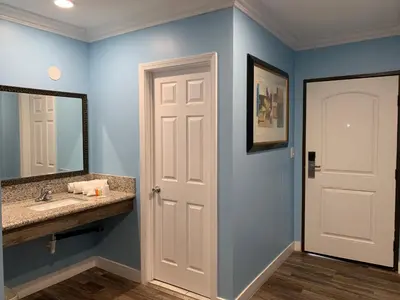 a bathroom with a sink and a mirror at Redondo Beach Motel - LAX in Gardena