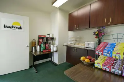 a office with a table with a bowl of food at Days Inn by Wyndham Riverside Tyler Mall in Riverside