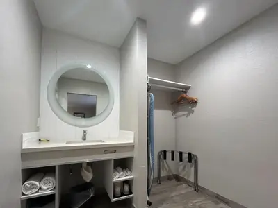 a bathroom with a sink and a mirror at Motel 6 Pasadena, CA Old Town Pasadena Area in Pasadena