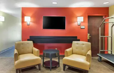 a waiting room with two chairs and a tv at Extended Stay America Suites - Los Angeles - Valencia in Stevenson Ranch