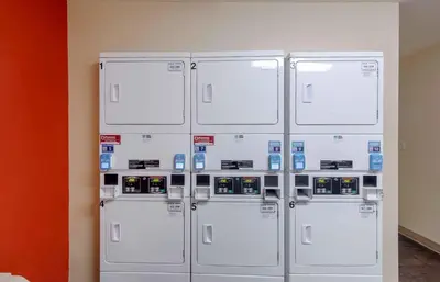 four machines are lined up against a wall at Extended Stay America Suites - Los Angeles - Simi Valley in Santa Susana Knolls