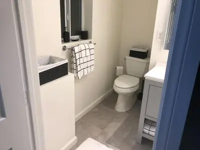 a small bathroom with a toilet and a sink at VacaStay on Scandia Way in Los Angeles