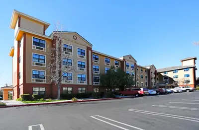 an empty parking lot in front of a building at Extended Stay America Suites - Los Angeles - Burbank Airport in Burbank