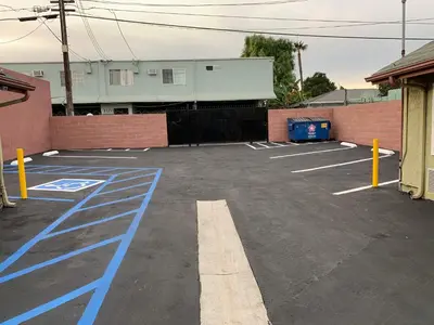 a parking lot with blue markings in a building at Vegas motel in West Athens