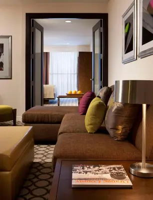 a living room with a couch and a table at Hyatt Regency Orange County in Anaheim