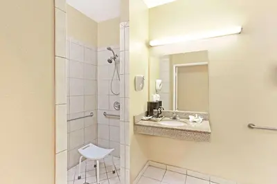 a bathroom with a sink and a shower at Super 8 by Wyndham North Hollywood in North Hollywood
