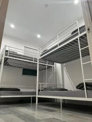 two bunk beds are in a room with at Modern Hostel address changed in Los Angeles