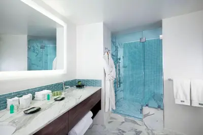 a bathroom with a sink and a shower at The Westin Bonaventure Hotel & Suites, Los Angeles in Los Angeles