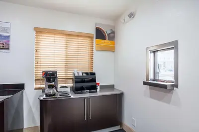 a kitchen with a counter with a coffee maker on it at Motel 6-Ventura, CA - Downtown in Ventura