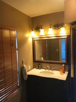 a bathroom with a sink and a mirror at paradise luxury experience in Woodland Hills