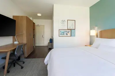 a hotel room with a bed and a desk at Element Ontario Rancho Cucamonga in Ontario