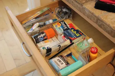 a drawer in a cabinet filled with many items at Private Guest Suite in West Los Angeles in Los Angeles