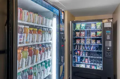 a refrigerator filled with lots of drinks and drinks at Best Western Canoga Park Motor Inn in Canoga Park