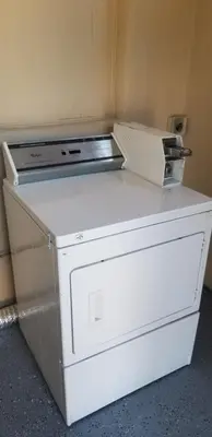 a white stove sitting on top of a refrigerator at Lotus by Hotel Inn in Ontario