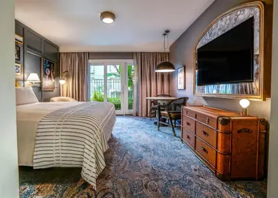 a hotel room with a bed and a television at Hotel Amarano Burbank-Hollywood in Burbank