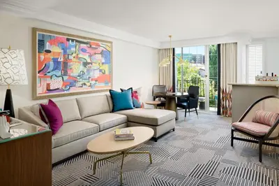 a living room with a couch and a table at Le Parc at Melrose in Los Angeles