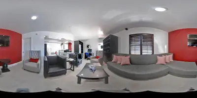 a living room with a couch and a table at Legend Hotel Hollywood in Los Angeles