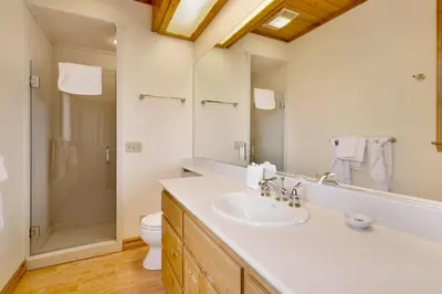 a bathroom with a sink and a shower and a toilet at Starlight Vistas-1524 by Big Bear Vacations in Big Bear Lake
