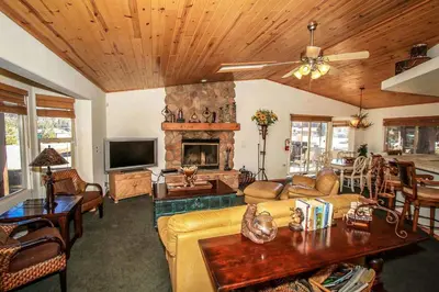 a living room with a couch and a fireplace at Can't Bear to Leave-1156 by Big Bear Vacations in Big Bear Lake