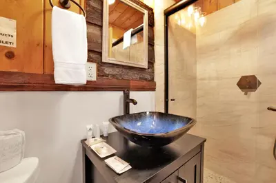 a bathroom with a bowl sink on a counter at Shore Acres Lodge-450 by Big Bear Vacations in Big Bear Lake