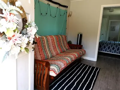 a living room with a couch and a rug at Pasadena suite with private entrance in Pasadena