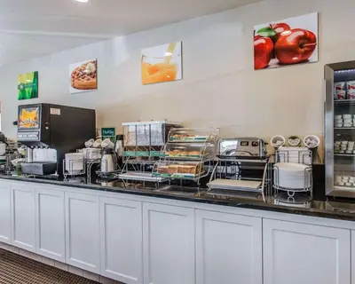 a buffet line with food on display in a store at Quality Inn Rosemead-Los Angeles in Rosemead