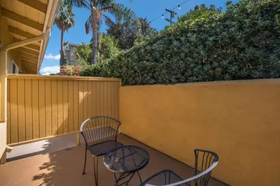 two chairs and a table on a patio at Best Western Woodland Hills in Woodland Hills