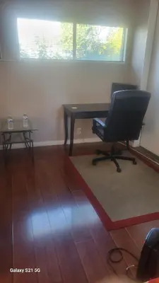 a office with a desk and a chair in a room at Woodland Hills BEST Priced Room in Woodland Hills