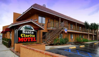 a santa clica motel sign in front of a building at Santa Clarita Motel - Near six Flags Magic Mountain - Valencia in Santa Clarita