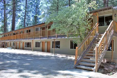 a house with a staircase in front of it at Goldmine Lodge in Big Bear Lake