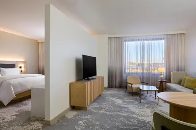 a hotel room with a bed and a television at The Westin Los Angeles Airport in Los Angeles