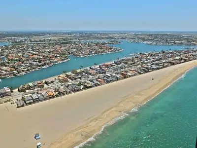 an aerial view of a beach and a harbor at Oceanfront Oasis in Long Beach