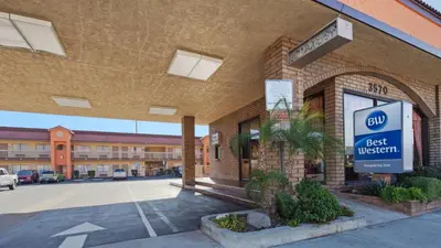 a building with a best western sign in front of it at Best Western Pasadena Inn in Pasadena