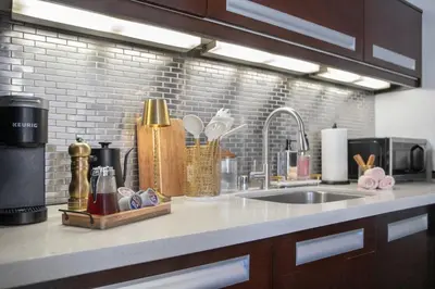 a kitchen with a sink and a counter top with a counter top at Fashion Loft 2 bedroom Downtown in Los Angeles