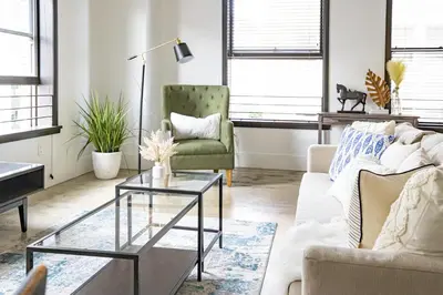 a living room with a couch and a table at Fashion Loft 2 bedroom Downtown in Los Angeles