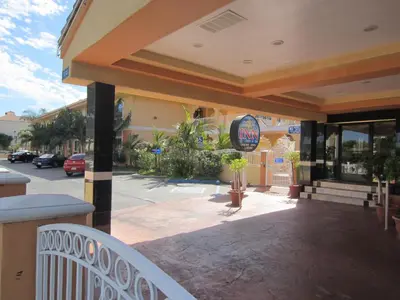a balcony of a building with a sign on it at Starlight Inn Canoga Park in Canoga Park