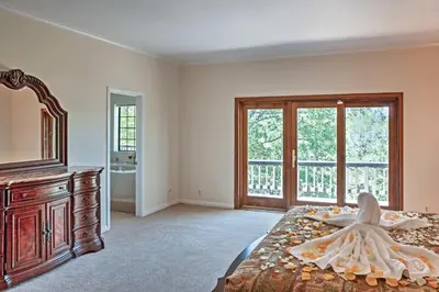 a bedroom with a bed with an octopus on it at Lake Arrowhead House with Lake Views and Wet Bar! in Lake Arrowhead