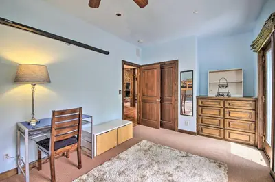 a home office with a desk and a chair at Incredible Lake Arrowhead Home with Views and Decks! in Lake Arrowhead