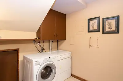a laundry room with a washer and dryer at Luxury Lodge-1888 by Big Bear Vacations in Big Bear Lake