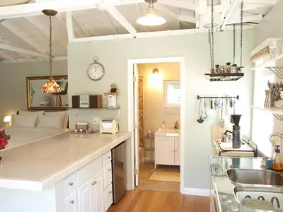 a kitchen with a sink and a counter top at Culver City Escape with Pool, Near Disneyland Park! in Los Angeles