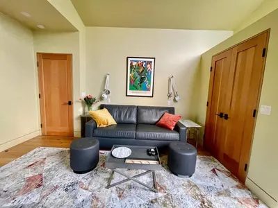 a living room with a couch and a table at Del Rey/Culver City Dream Oasis in Los Angeles