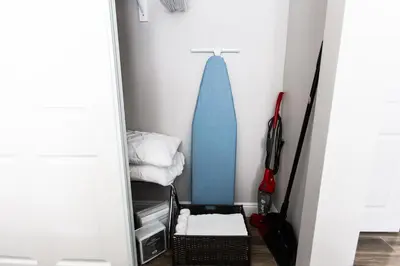 a small room with a surfboard in the corner at Long Beach Duplex King Bed Pet Friendly Nurses Surgeon Business Travelers Near St Marys Medical Center & Downtown in Long Beach
