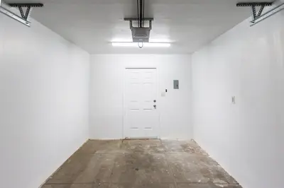 an empty room with a white door and white walls at Long Beach Duplex King Bed Pet Friendly Nurses Surgeon Business Travelers Near St Marys Medical Center & Downtown in Long Beach