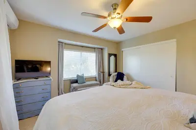 a bedroom with a bed and a ceiling fan at Chic Peaceful Retreat 16 Mi to Beaches and Wineries! in Santa Paula