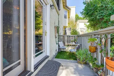 a patio with a table and chairs on a balcony at Chic Peaceful Retreat 16 Mi to Beaches and Wineries! in Santa Paula