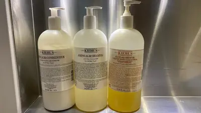 a group of three bottles of cleaning products in a machine at HOLLYWOOD HILLS JETLINER VIEWS at STUDIO 1080 HOLLYWOOD in Los Angeles